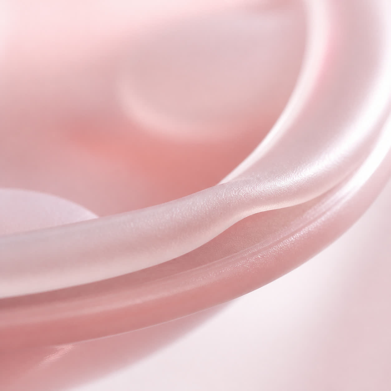 The two-layer silicone flange that forms the seal
